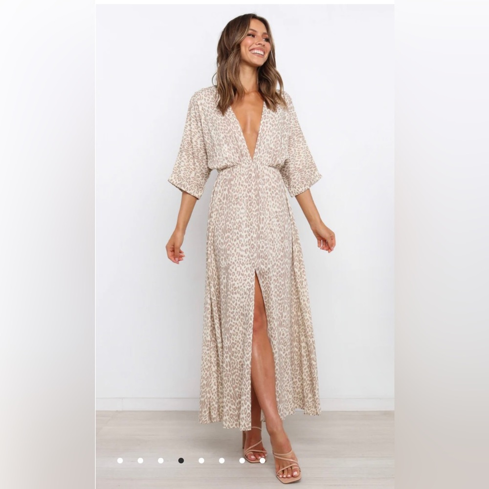 Billy J boutique cheetah dress with slit and plunging neckline